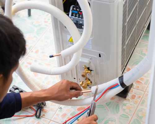 Electrician repairing and troubleshooting electrical circuits in a home.